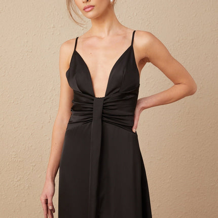 A black satin maxi dress with a V neckline and front slit named Blanche