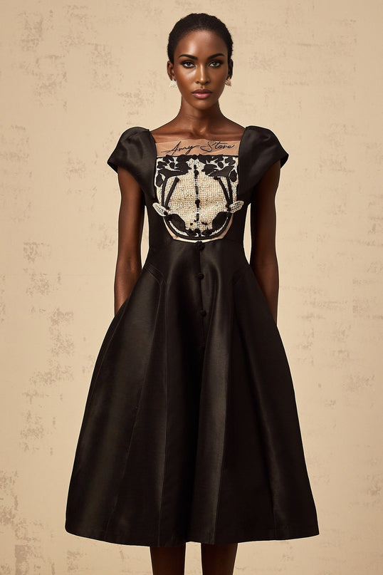 A black satin midi dress with floral applique details named Ulrique
