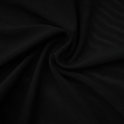 A black sleeveless top with faux fur trim and tulle overlay