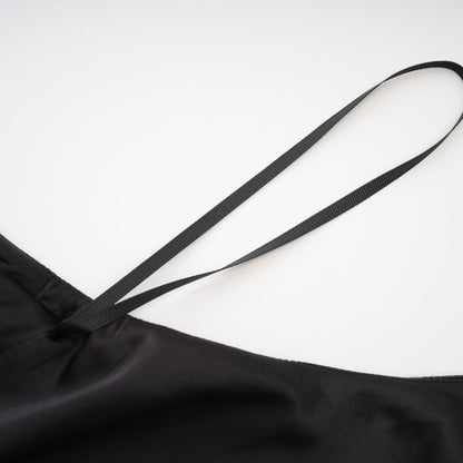 Embellished black dress with crystal turtle neck sleeveless ankle length rear zip and side slit Made of 100% Polyester