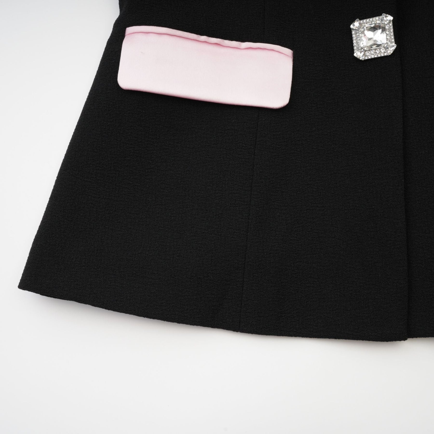 Tweed dress with notched lapels cinched waist bowknot detailing front button fastening and contrast colors