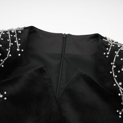 A black velvet mini dress with crystal embellishments named Emilie