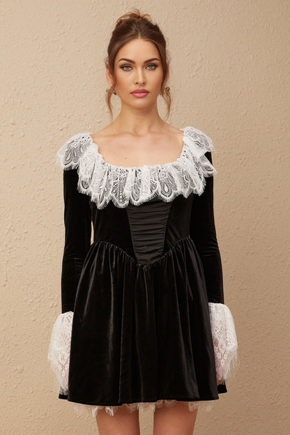 A black velvet mini dress with lace trim details named Fabiana