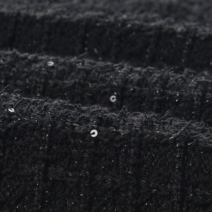 Text Black jacket with long sleeves round neck and four chest flap pockets Front button fastening textured waffleknit 80% Polyester and 20% Cotton composition
