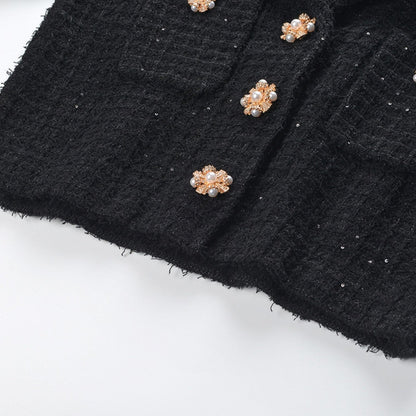 Bold black jacket with notched lapels long sleeves front patch pockets and unique waffleknit texture Made of 80% durable polyester and 20% comfortable cotton Chic black skirt with pleated edge in a modish thigh length Composed of 80% highquality polyester and 20% soft cotton