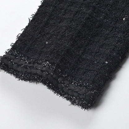 Sophisticated black dress with pleated skirt in waffleknit fabric  80% Polyester 20% Cotton