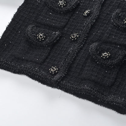 Textured waffleknit dress with functional pockets and front button fastening composed of 80% Polyester and 20% Cotton