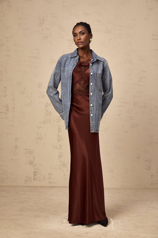 A blue denim shirt with vertical stripes and embellishments called Josephine
