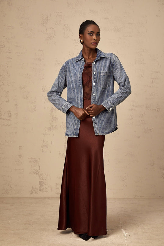A blue denim shirt with vertical stripes and embellishments named Josephine