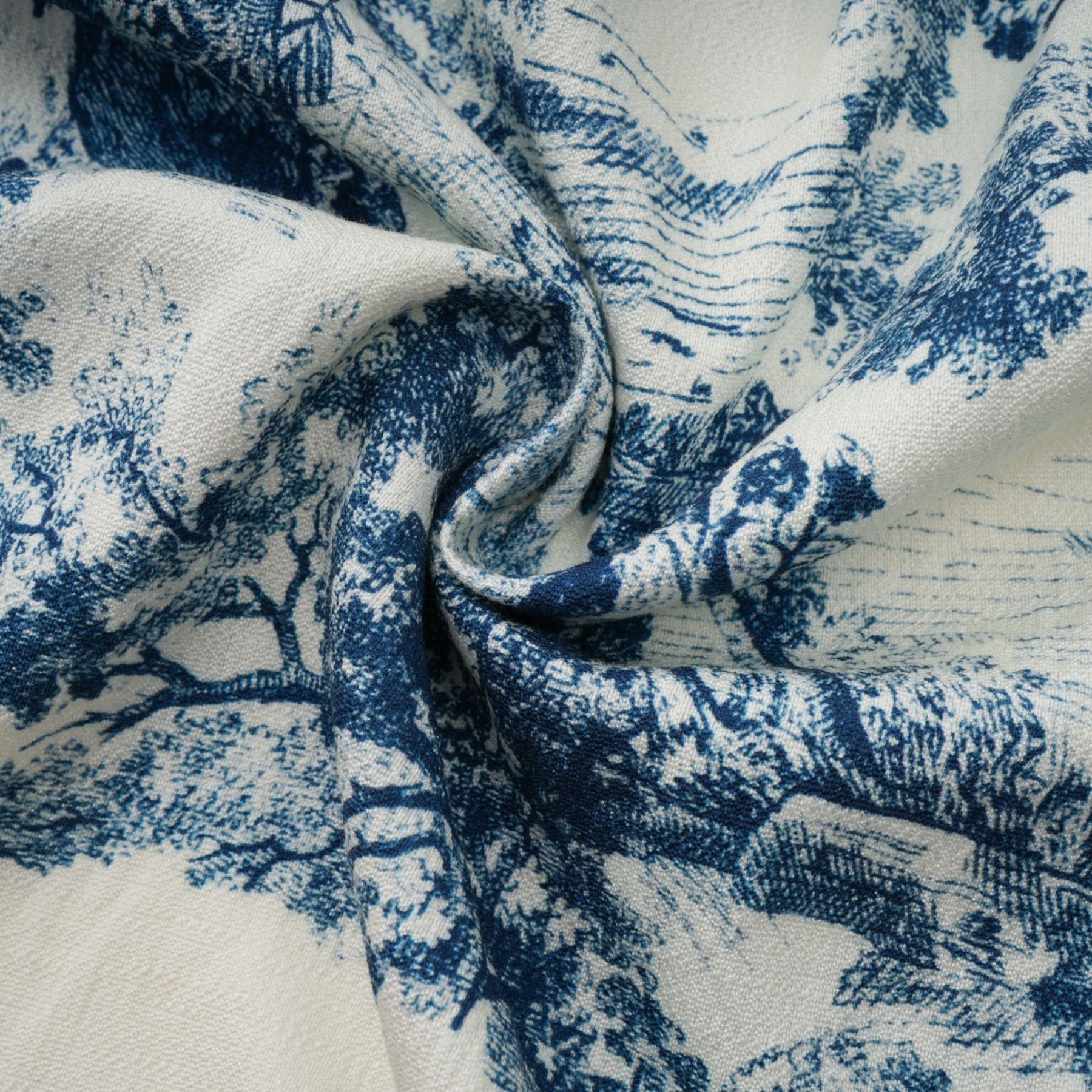 A blue midi dress with a graphic print pattern called Adelaide