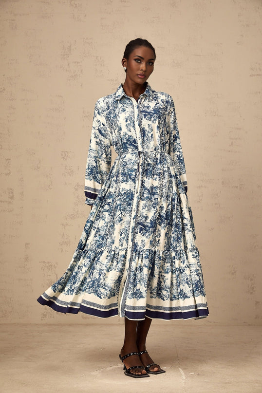 A blue midi dress with a graphic print pattern named Adelaide