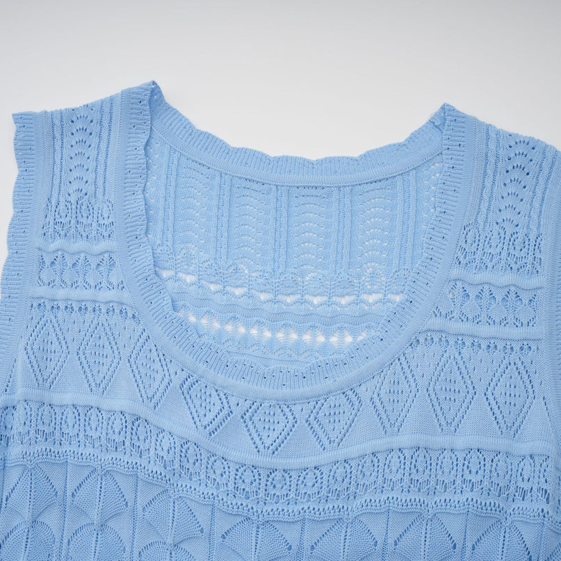 A blue midi dress with crochet knit pattern and ruffled trim details named Mailys