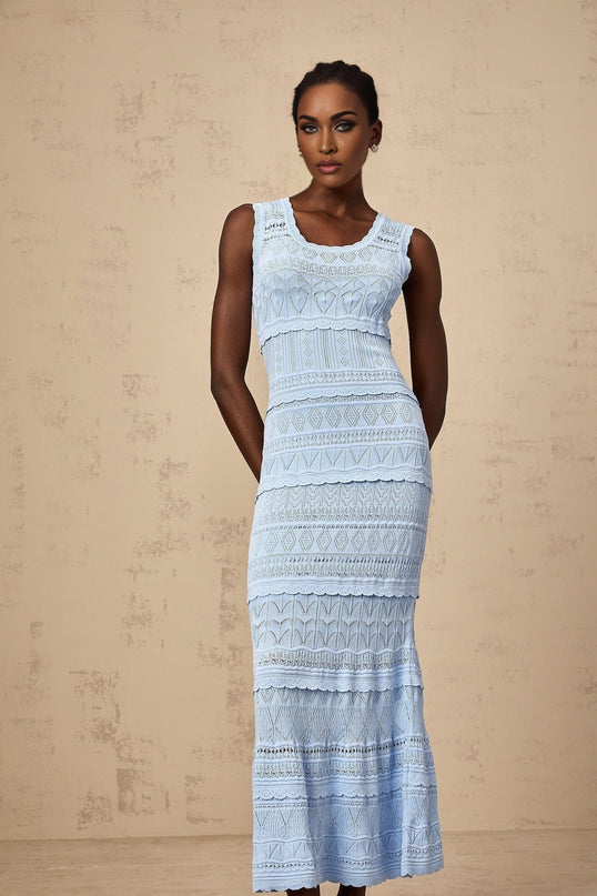 A blue midi dress with crochet knit pattern and ruffled trim details named Mailys