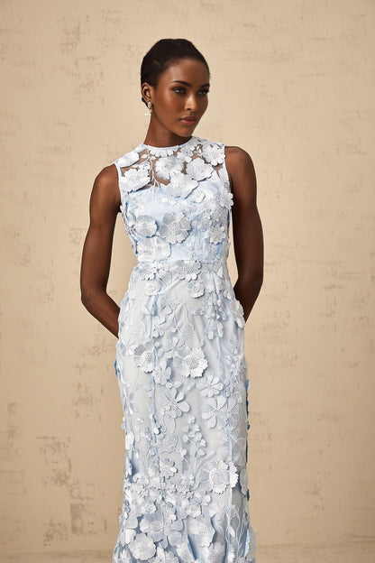 A blue midi dress with floral applique details by Herta