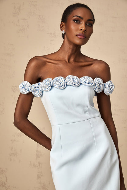 A blue mini dress with floral appliqués named Hedwige featuring a short hemline and decorative flower details