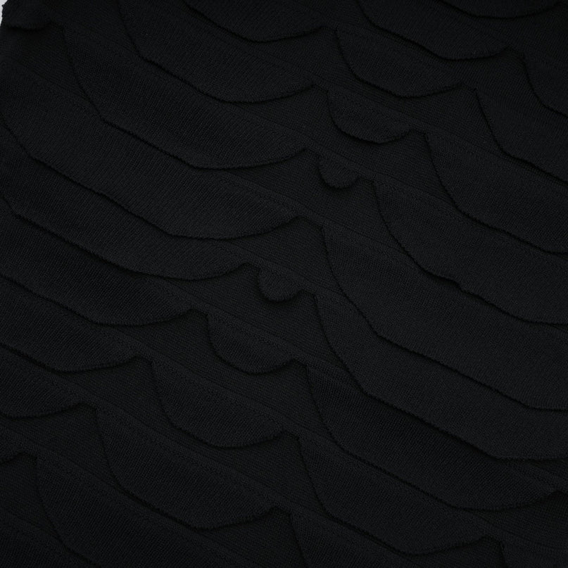 A brown and beige snake pattern midi dress with a flared godet skirt and long sleeves