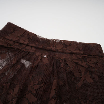 A brown flared midi dress made of chantilly lace named Sylvie with delicate floral patterns and a flattering silhouette