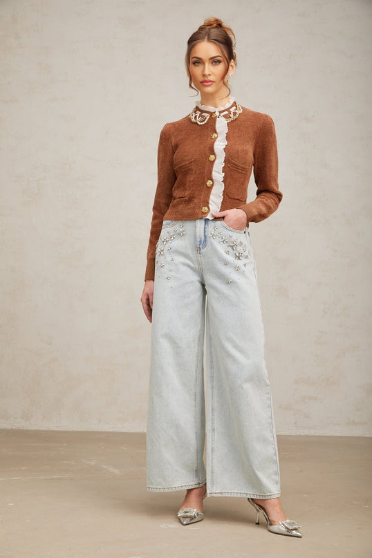 A brown knit cardigan with ruffled details and embellishments named Elisabetta