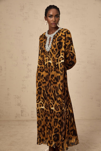 A brown leopard print midi dress with embellishments and a flowy silhouette named Anais