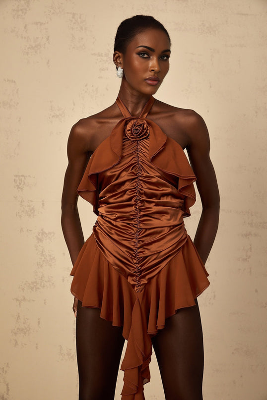 A brown mini dress with ruched detailing and floral appliques named Leonie