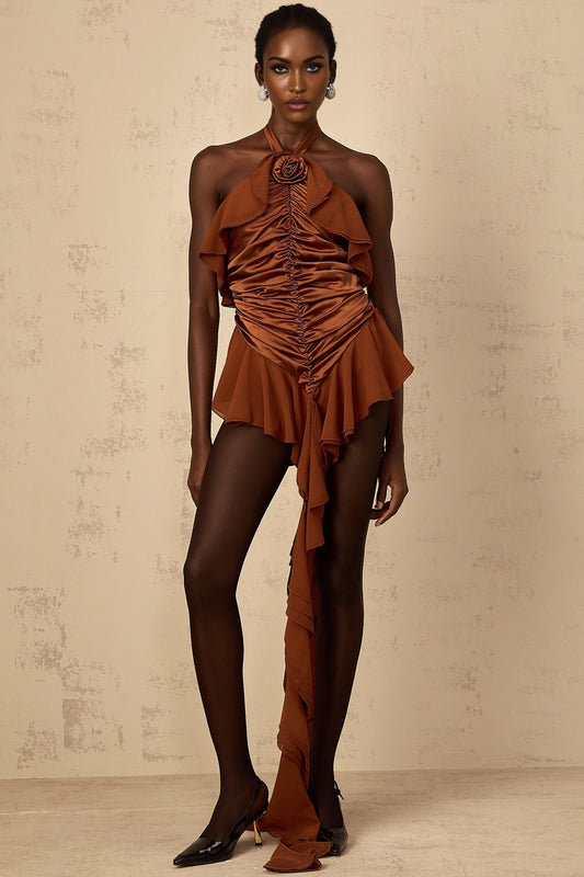 A brown mini dress with ruched fabric and floral applique details named Leonie