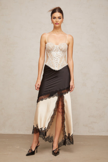 A bustier top with a floral lace design featuring panelling named Karine
