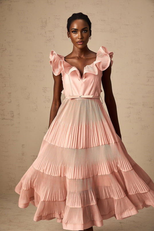 A coralpink midi dress with pleated details and frilled accents named Valentina