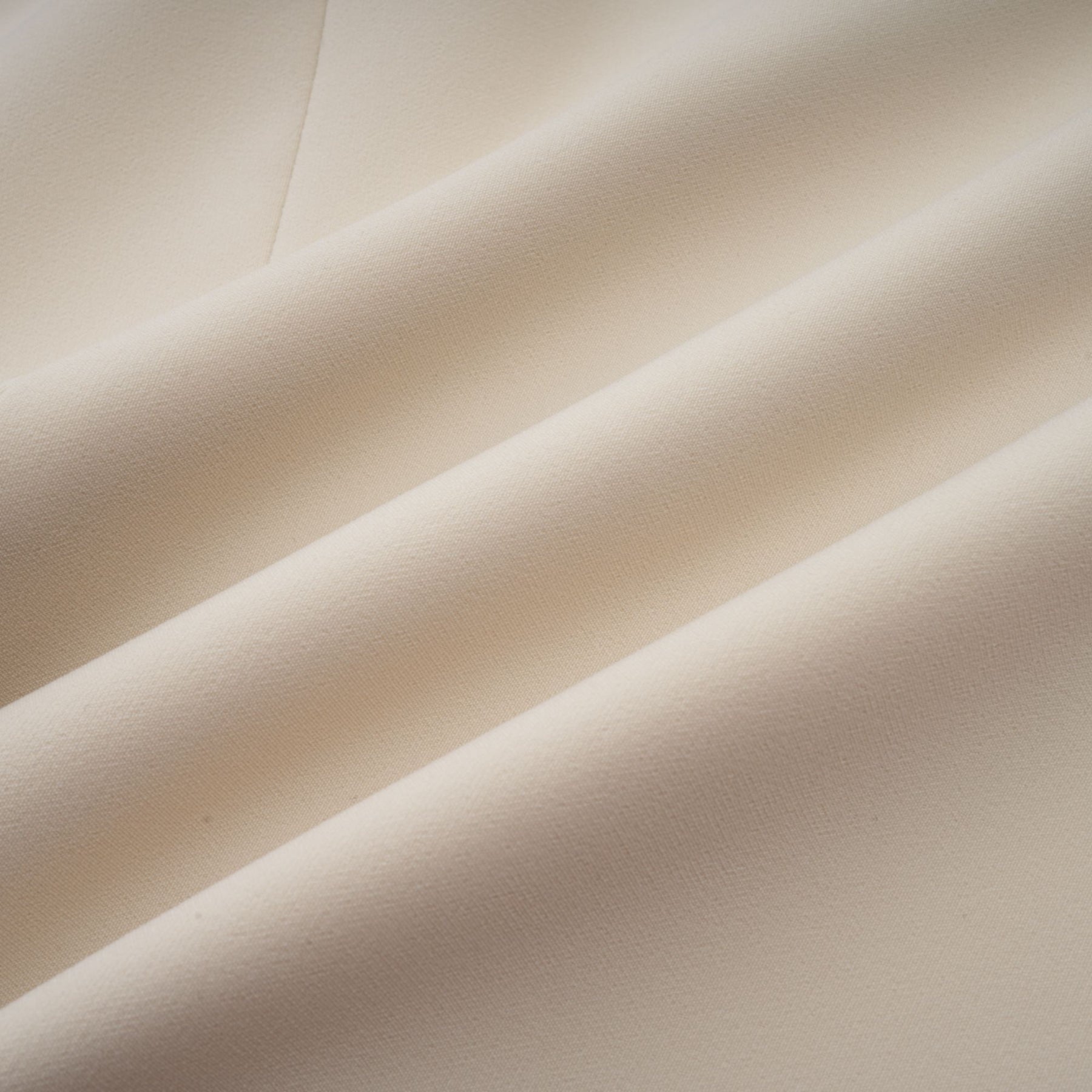 A creamwhite fitted mini dress by Chloé worn by a model standing against a plain background showcasing the garments sleek silhouette and elegant design