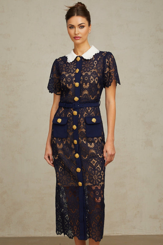 A dark blue midi dress with a floral crochet lace pattern covering the entire garment