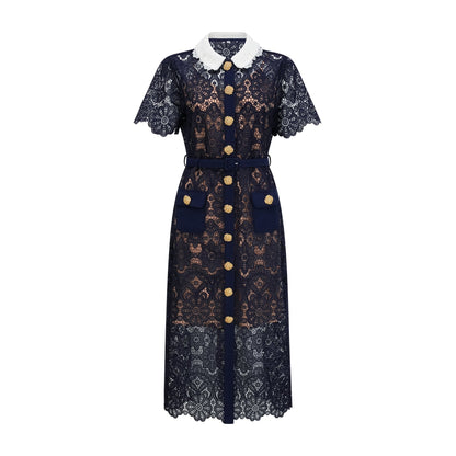 A dark blue midi dress with floral crochet lace pattern featuring an intricate design throughout the garment