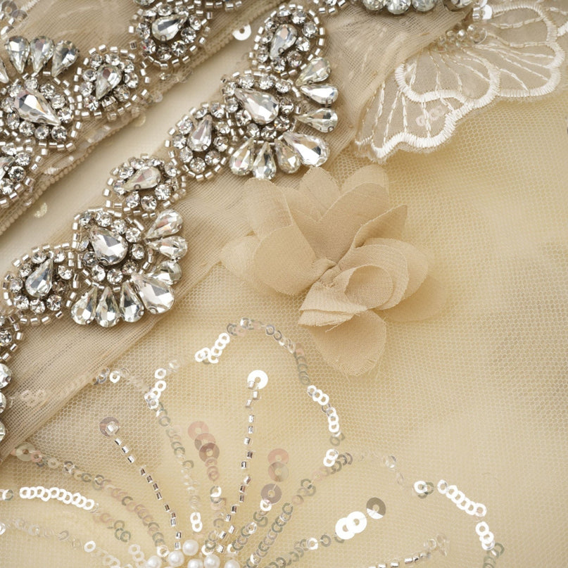 A delicate semisheer jacket made of organza fabric adorned with floral beaded embellishments giving it a light and luxurious appearance