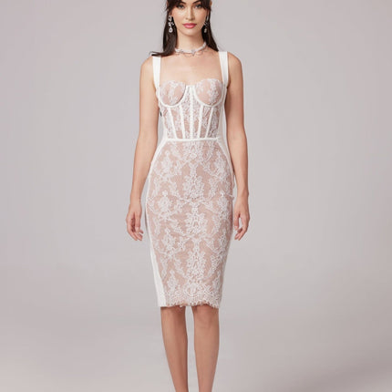 A fitted midi dress with a bustier style top in a bandage fabric design