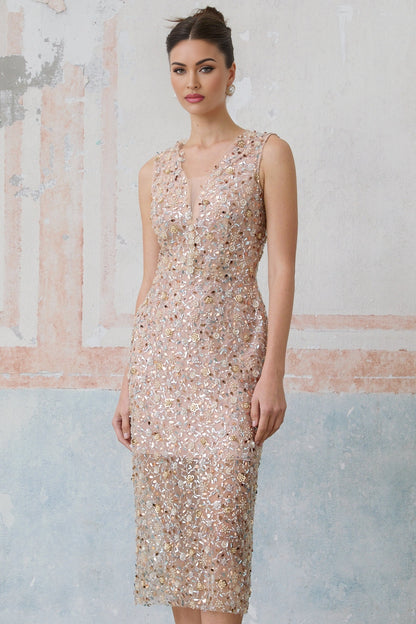 A fitted midi dress with an embellished floral pattern featuring marguerite flower motifs