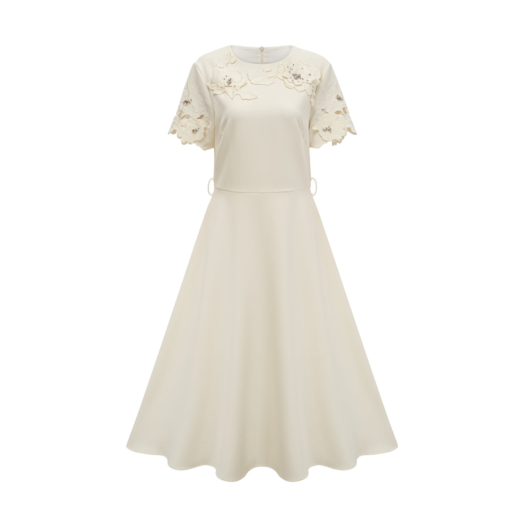 A flared midi dress in neutral tones featuring orange floral appliqués with a fitted bodice and flowing skirt