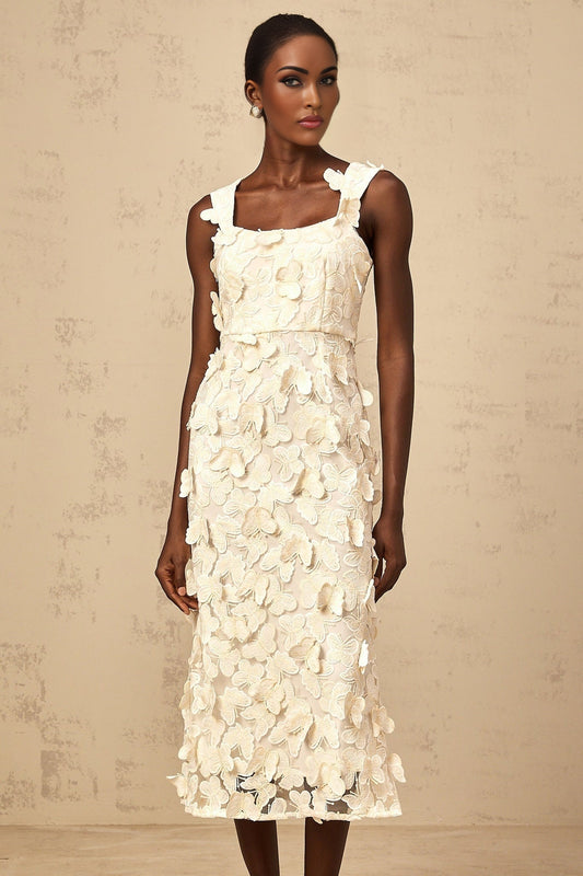 A flared midi dress with butterfly appliques in a Narcisse style