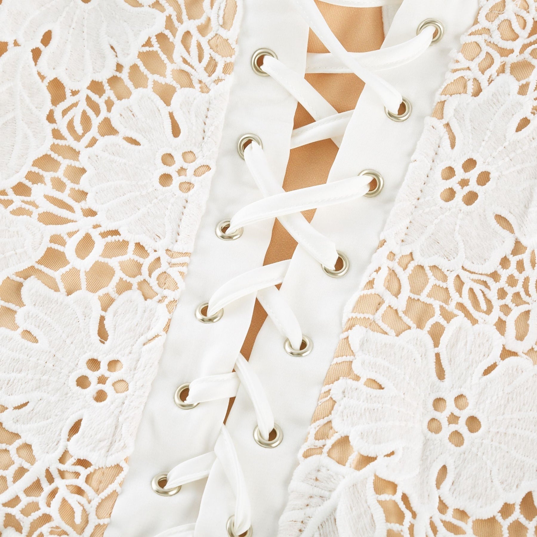 A floral embroidered midi dress in the Florence style featuring delicate stitched flower patterns on a flowing fabric that falls to midcalf length