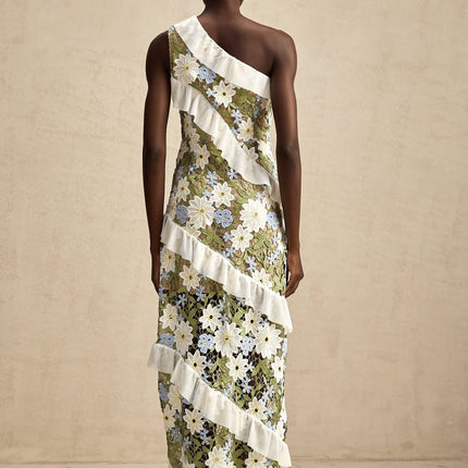 A floral embroidered midi dress named Clemence with a delicate pattern and feminine silhouette