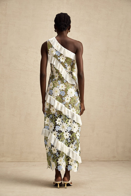 A floral embroidered midi dress named Clemence with a delicate pattern and feminine silhouette