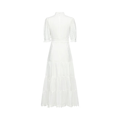 A floral lace midi dress with embroidered flower details