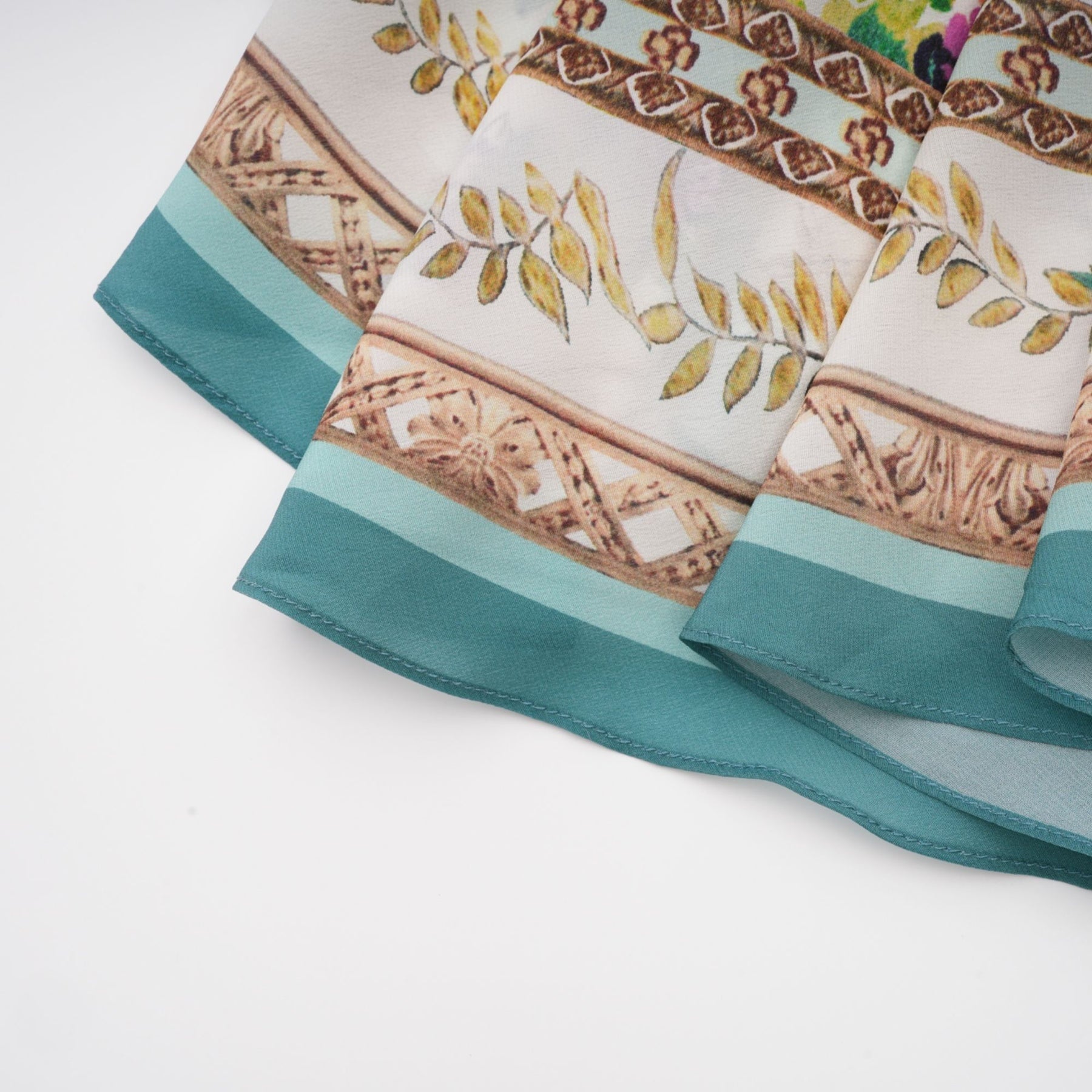 A floral print midi dress with Philippineinspired design featuring decorative embellishments and a colorful floral pattern on a light background