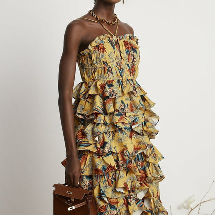 A floral print midi dress with tiered ruffles and a feminine silhouette named Apolline