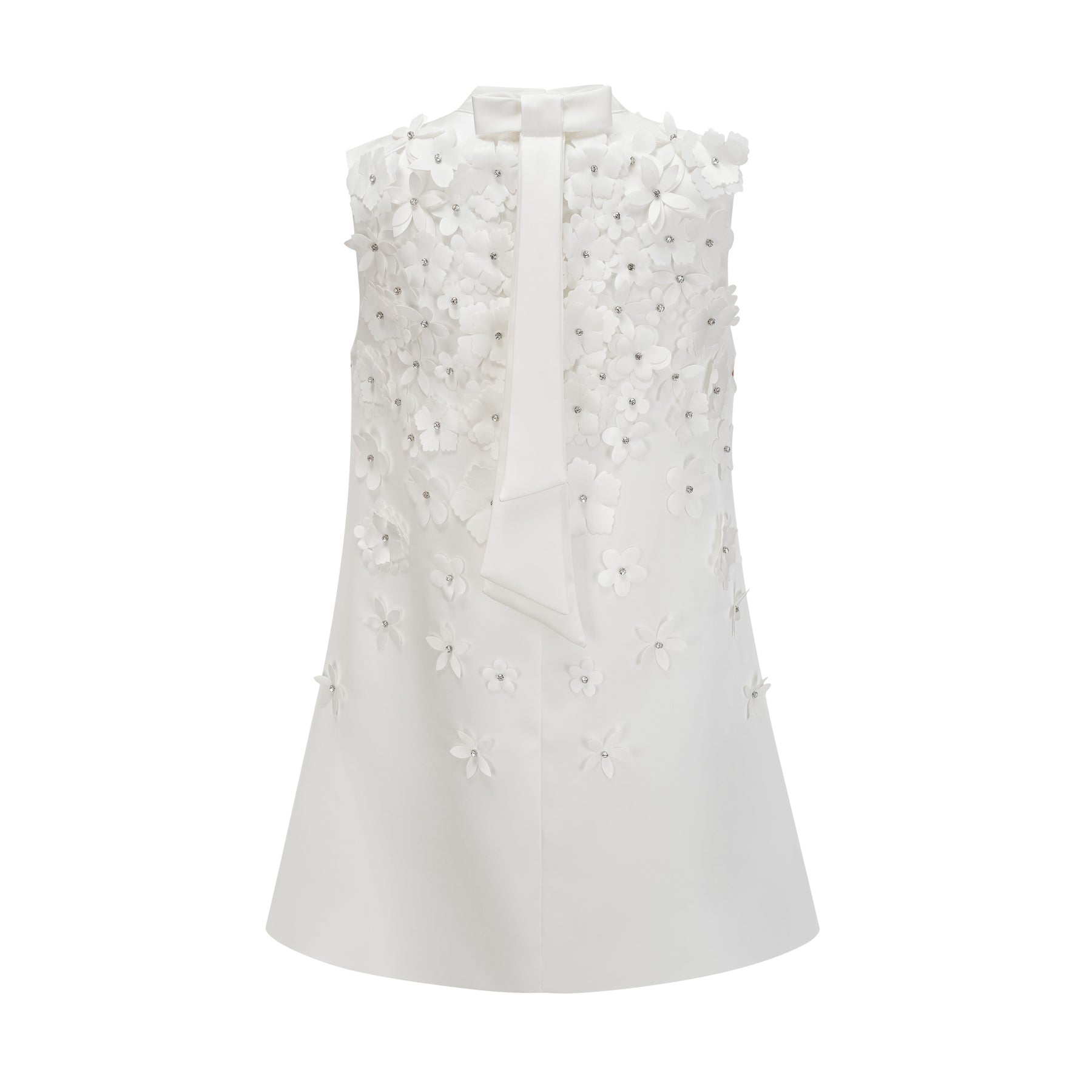 A floral print mini dress with short sleeves and a fitted silhouette featuring a design inspired by faux flowers named Genevieve