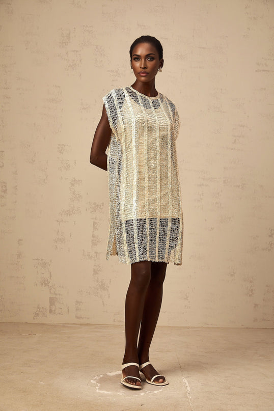 A gold sequined mini dress with cutout details named Solene