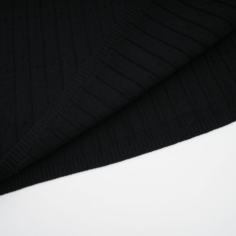 A knit midi dress with lace trim details named Noa