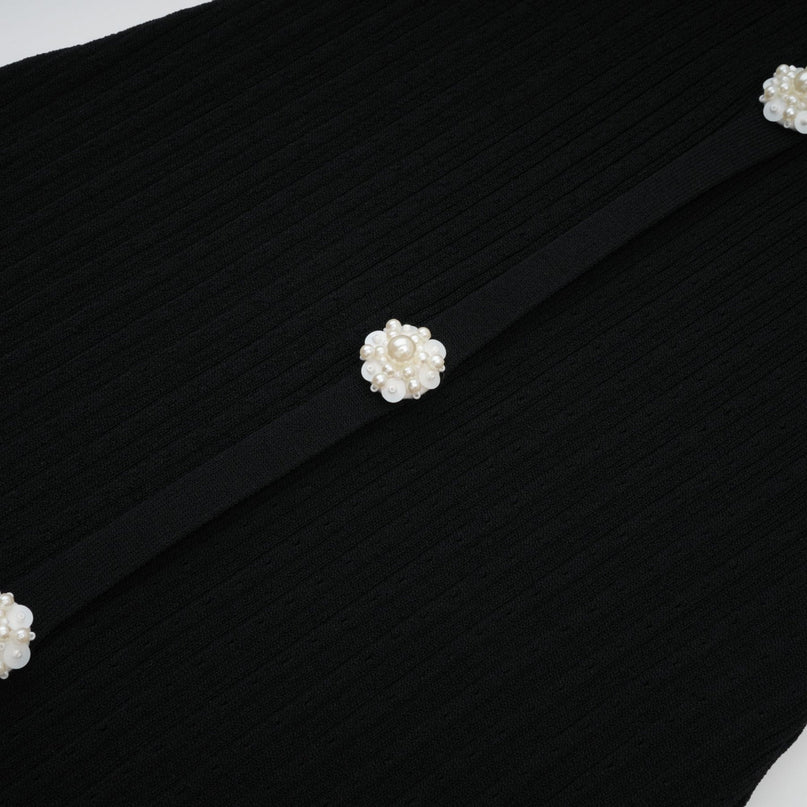 A knit midi dress with lace trim details named Noa