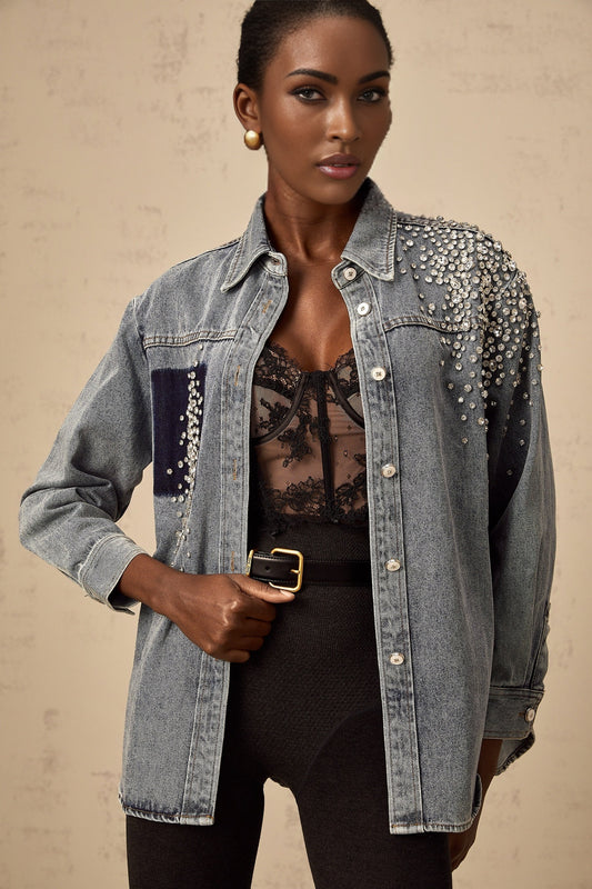 A light blue denim shirt with rhinestone embellishments scattered across the fabric named Segolene