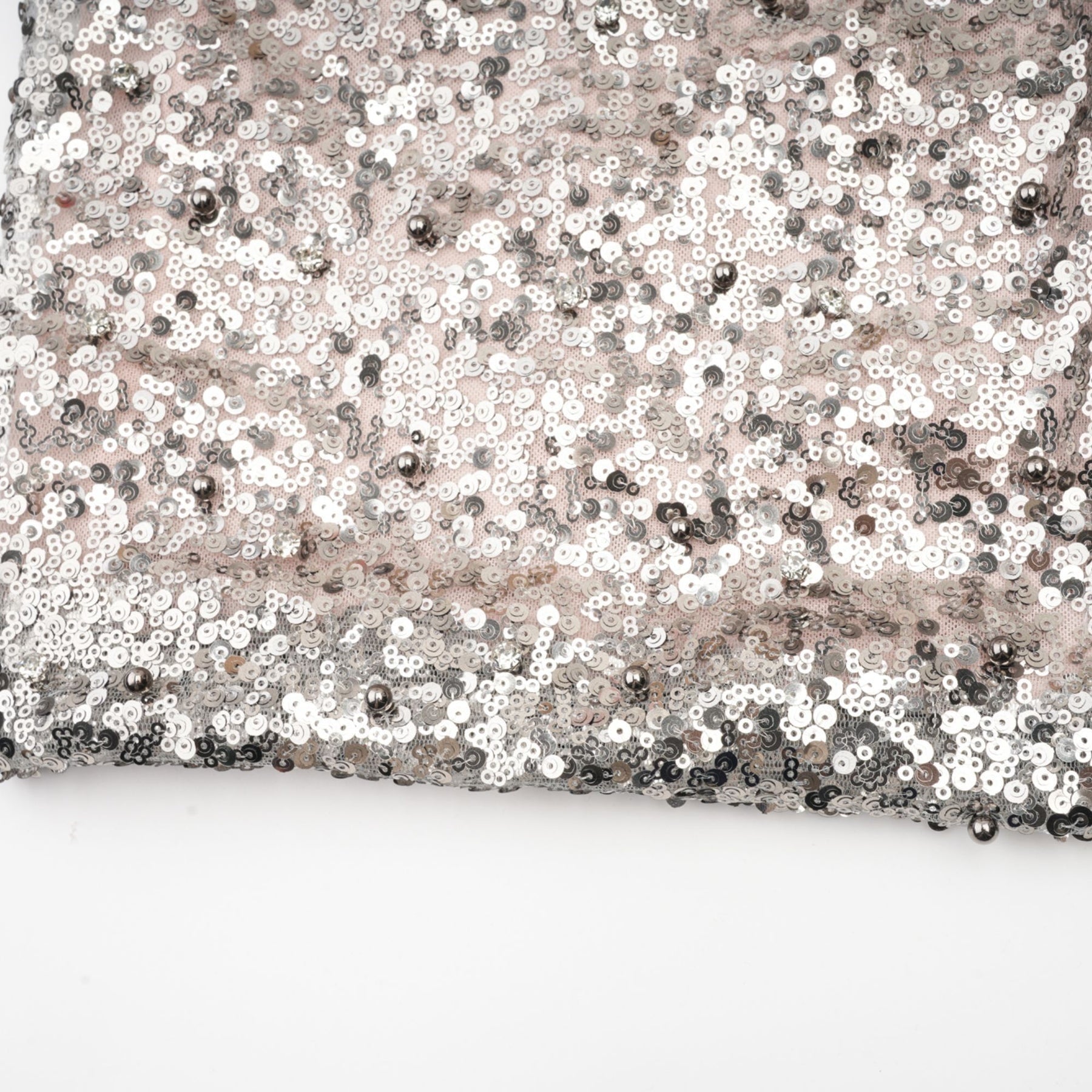 A long asymmetric maxi dress with sequin embellishments named Juliette featuring a flowing silhouette and sparkling details