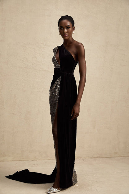 A long asymmetric maxi dress with sequin embellishments named Juliette featuring a shimmering design and uneven hemline