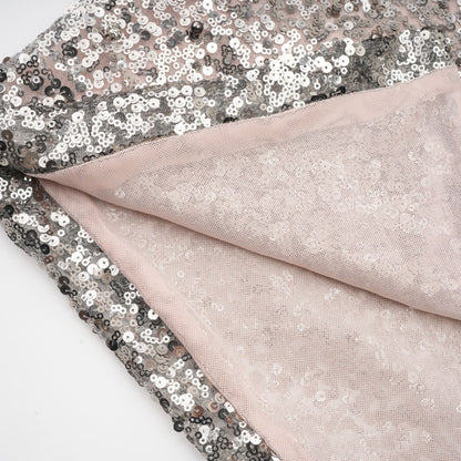 A long asymmetric maxi dress with sequin embellishments named Juliette featuring a sleek and elegant design