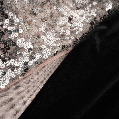 A long asymmetric maxi dress with sequin embellishments named Juliette featuring a sparkly design and uneven hemline